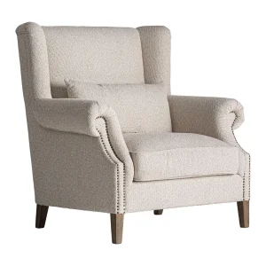 Sillón de madera de fresno tapizado en color crema Leiston
